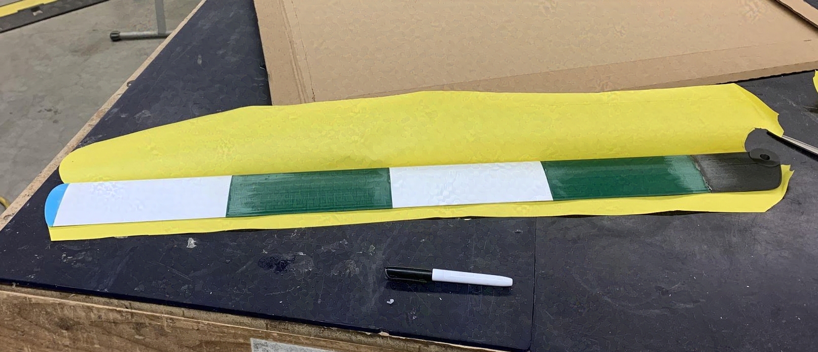 Yellow paper templates on the 3D-printed blade core