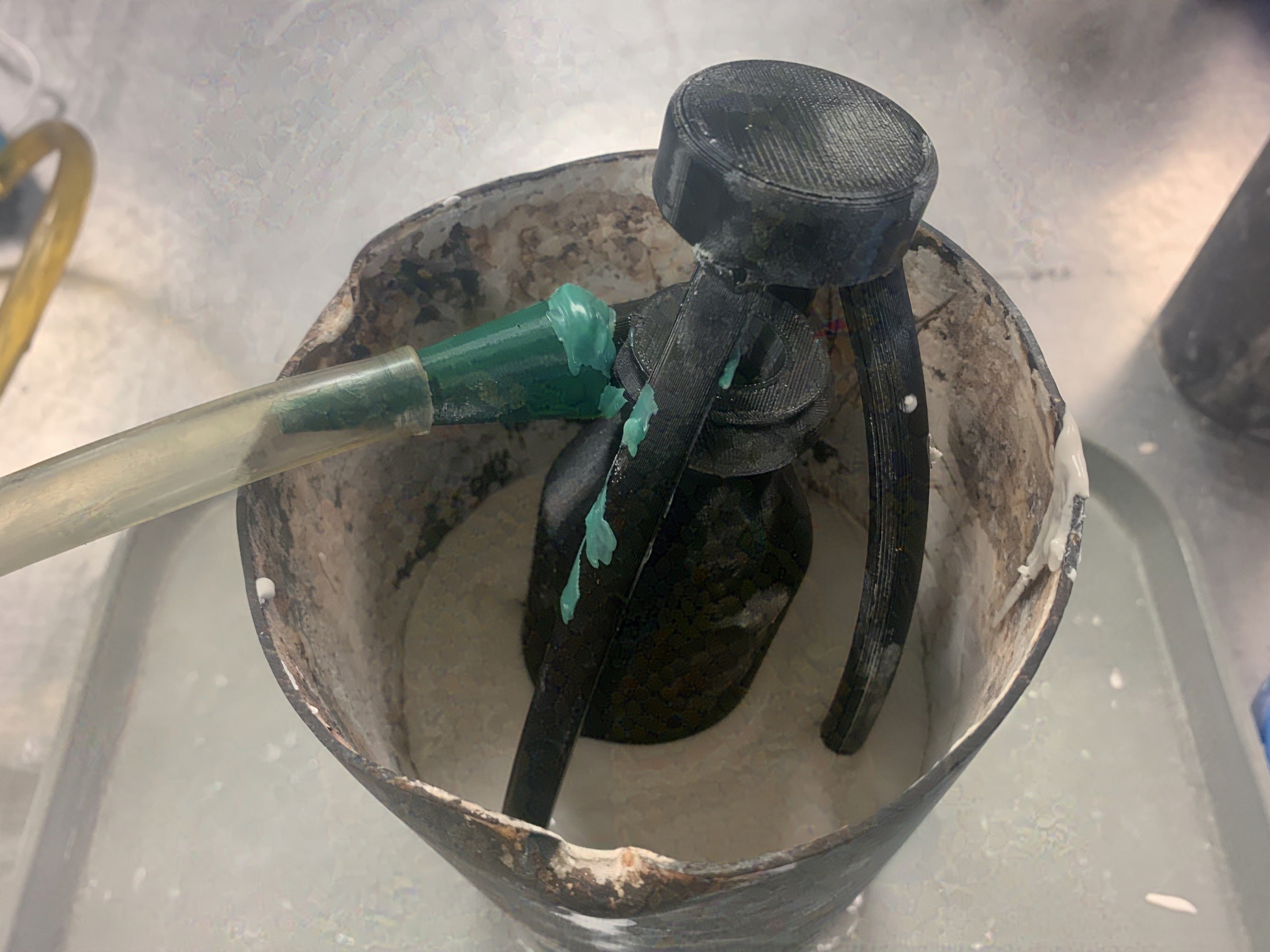 Sealing the casting pattern with wax in the investment flask
