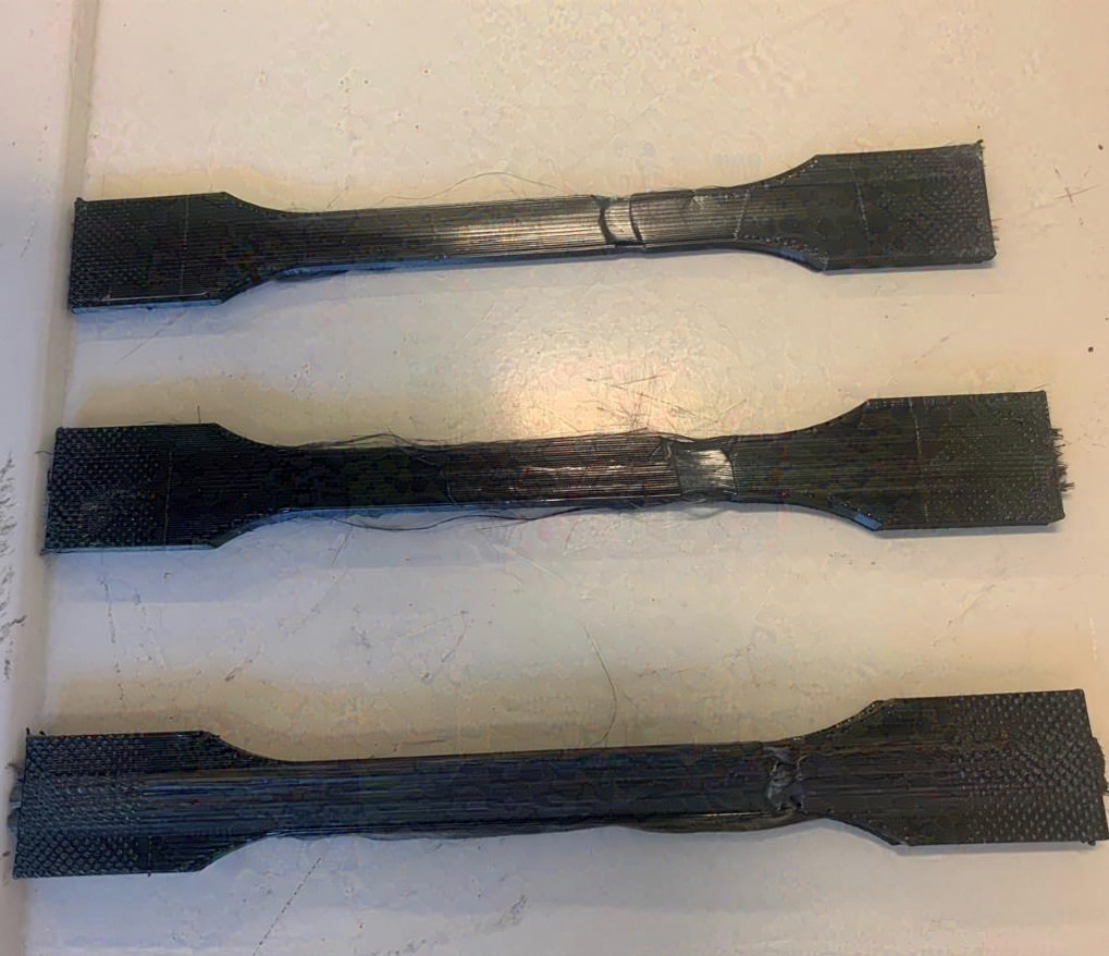 Fanned out single-layer carbon fiber test strips after testing