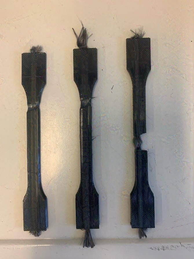 Fanned out three-layer carbon fiber test strips after testing