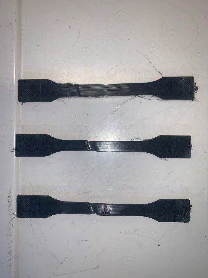 Standard unreinforced PETG test strips after tensile testing