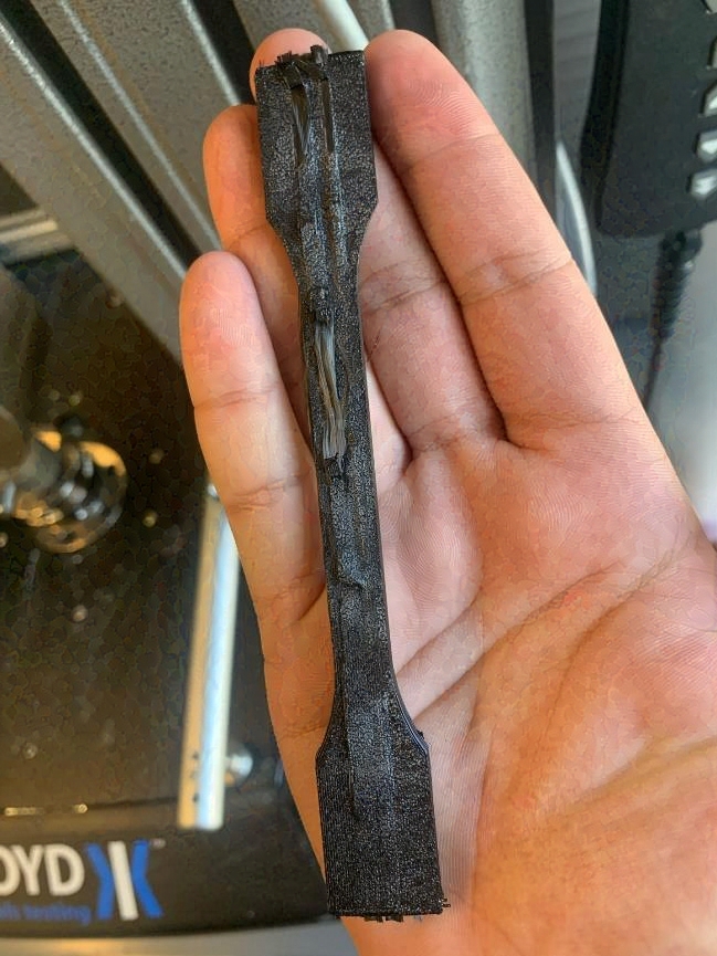 Single full-strand carbon fiber test strips after testing